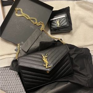 CASSANDRE YSL MATELASSÉ CHAIN WALLET IN GRAIN DE POUDRE EMBOSSED LEATHER